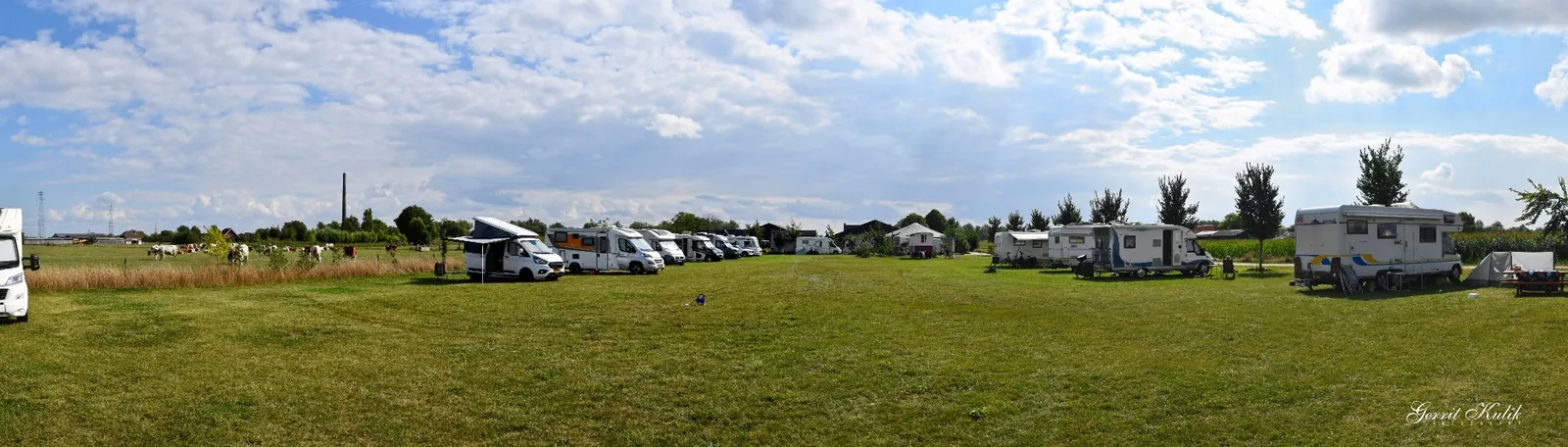 Panoramic view of Camper Site Bij den Doove and the surrounding farm landscape